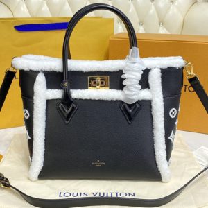 Replica Louis Vuitton M58908 LV On My Side MM handbag in Black Shearling and grained calf leather