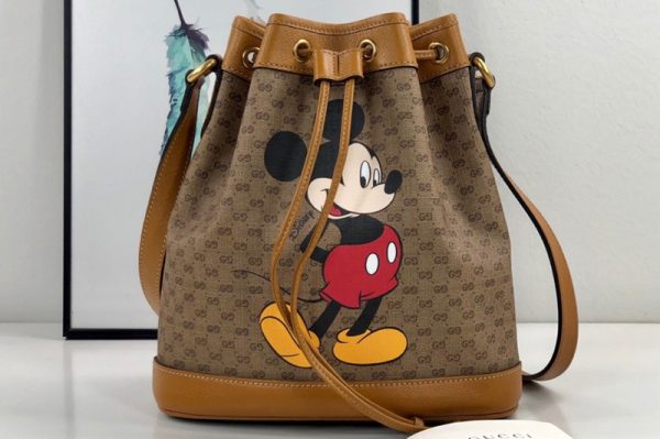 Replica Gucci 602691 Disney x Gucci small bucket bag in Beige/ebony mini GG Supreme canvas