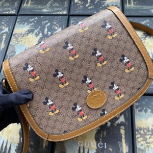 Replica Gucci ‎602694 Disney x Gucci small shoulder bag in Beige/ebony mini GG Supreme canvas