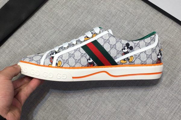 Replica Mens and Womens Gucci 606111 Disney x Gucci Tennis 1977 sneaker with Web in Silver GG Supreme