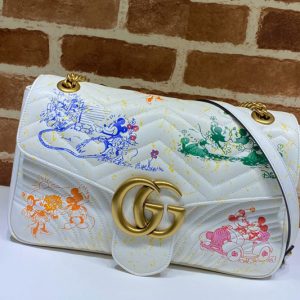 Replica Gucci 443496 Online Exclusive Disney x Gucci GG Marmont medium shoulder bag in White Leather