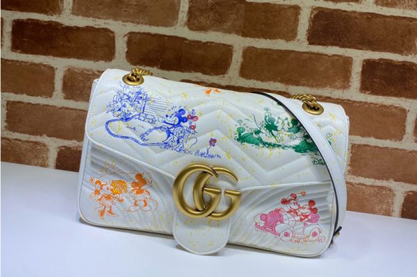 Replica Gucci 443496 Online Exclusive Disney x Gucci GG Marmont medium shoulder bag in White Leather