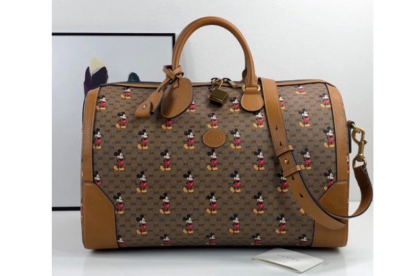 Replica Gucci ‎547953 Disney x Gucci medium carry-on duffle Bag in Beige/ebony mini GG Supreme canvas with Mickey Mouse