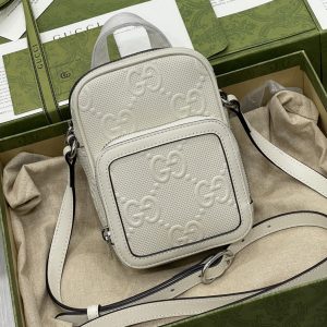 Replica Gucci 658553 GG embossed mini bag in White GG embossed leather