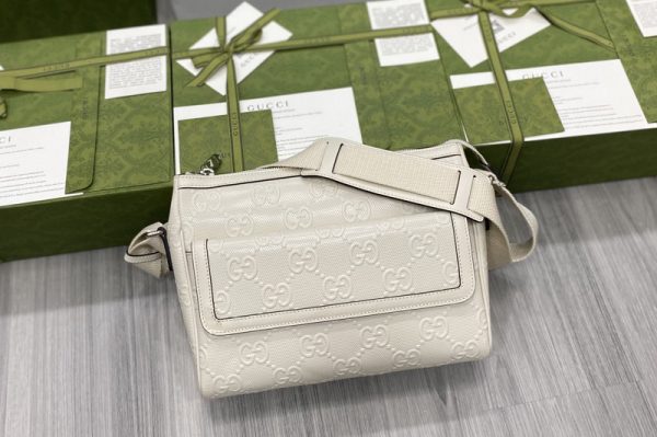 Replica Gucci 658565 GG embossed messenger bag in White GG embossed leather