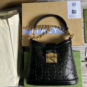 Replica Gucci 675788 Small GG shoulder bag in Black debossed GG leather