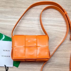 Replica Bottega Veneta 667048 Cassette mini bag in Orange Intreccio leather