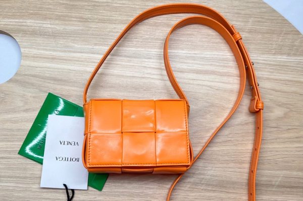 Replica Bottega Veneta 667048 Cassette mini bag in Orange Intreccio leather