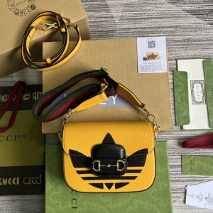 Replica Gucci 658574 adidas x Gucci Horsebit 1955 mini bag in Yellow and Black leather