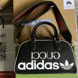 Replica adidas x Gucci 702397 mini duffle bag in Black and White leather