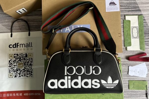 Replica adidas x Gucci 702397 mini duffle bag in Black and White leather