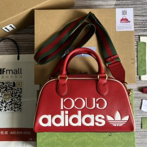 Replica adidas x Gucci 702397 mini duffle bag in Red and White leather