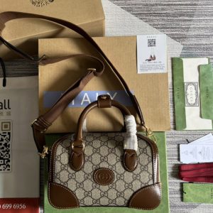 Replica Gucci ‎723306 Small duffle bag with Interlocking G in Beige and ebony GG Supreme canvas